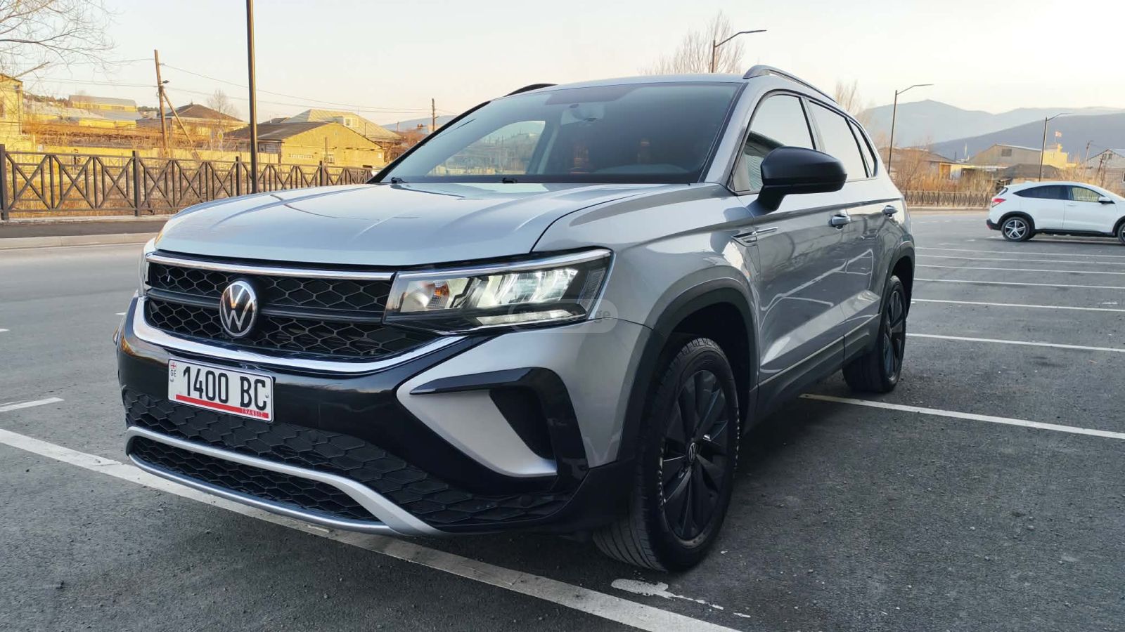 Volkswagen Taos - фото 1