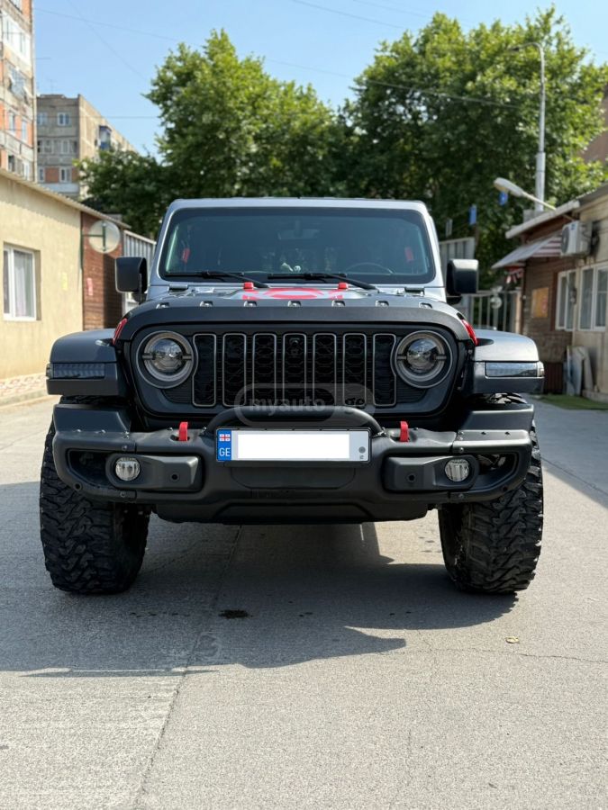 Jeep Rubicon 4dr 4x4 Crew Cab 5 ft. — миниатюра 1