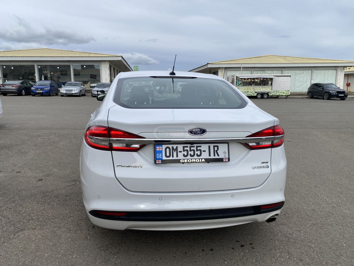 Ford Fusion - фото 7