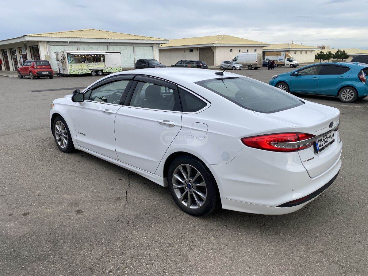 Ford Fusion - фото 8