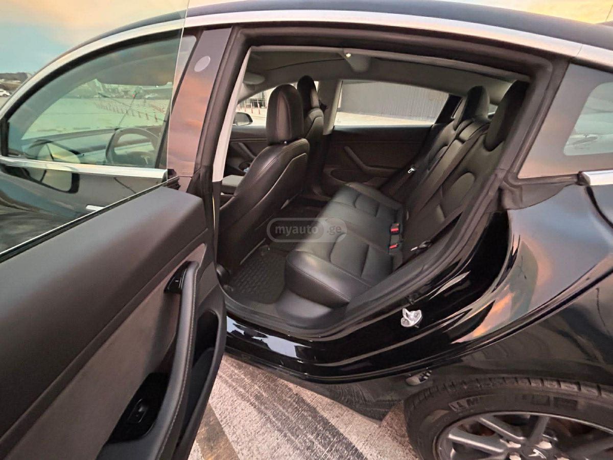Tesla Model 3 - фото 10