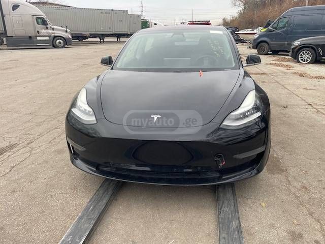 Tesla Model 3 - фото 12