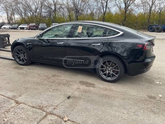 Tesla Model 3 - фото 13