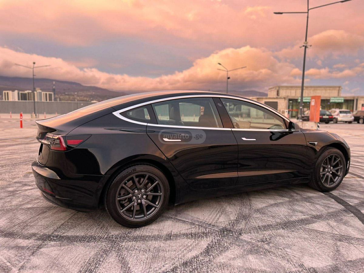 Tesla Model 3 - фото 7