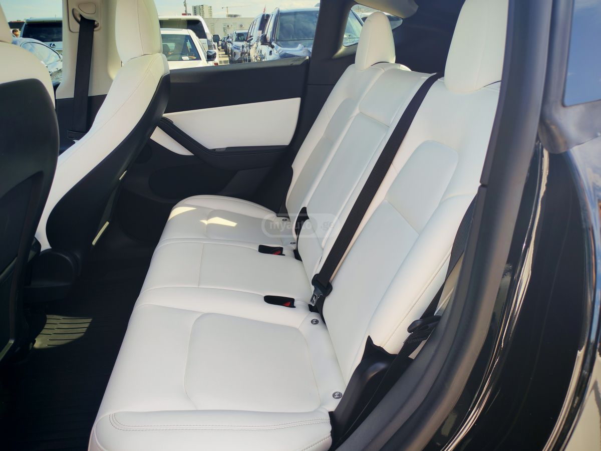 Tesla Model Y - фото 11