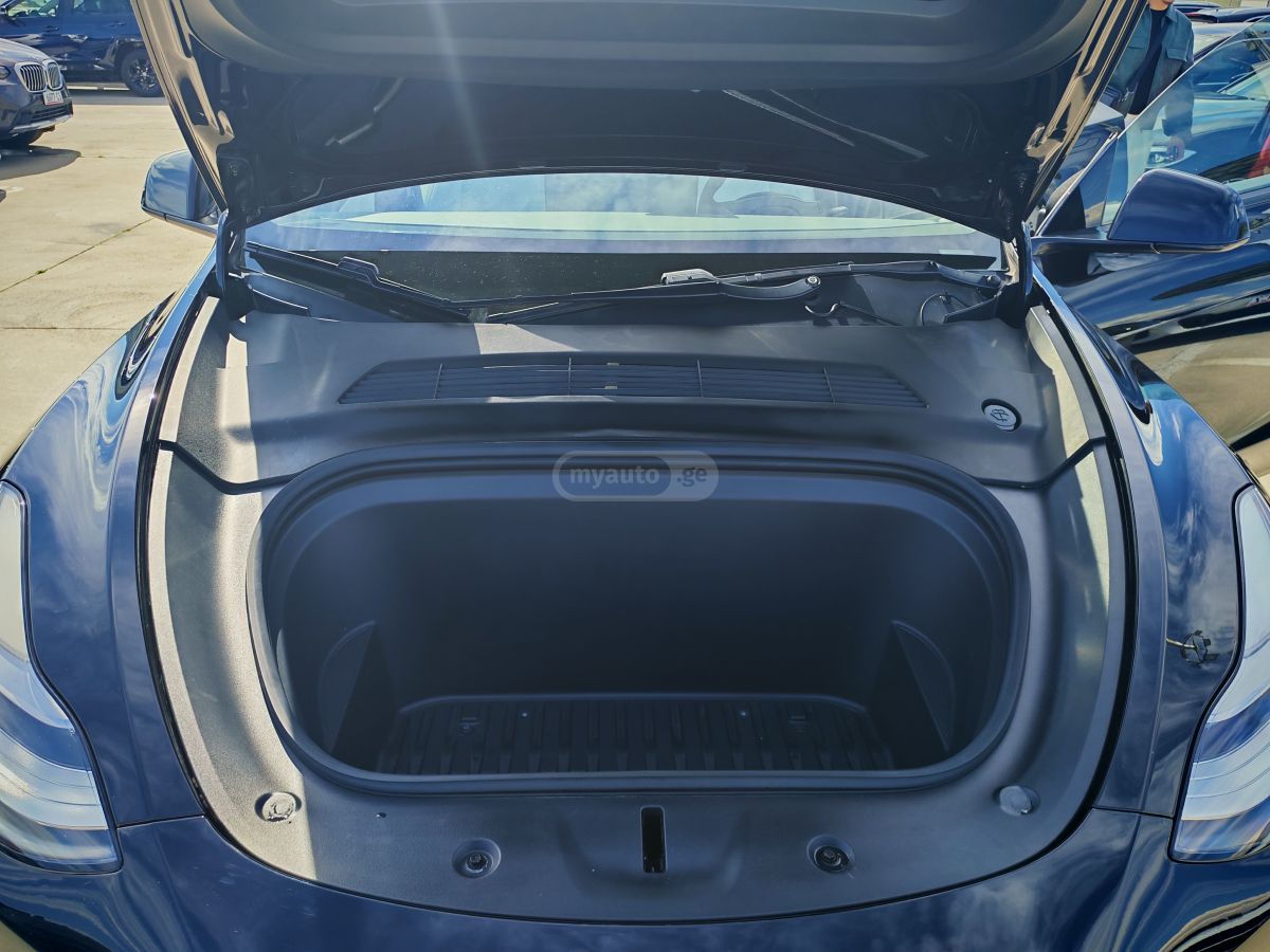 Tesla Model Y - фото 14