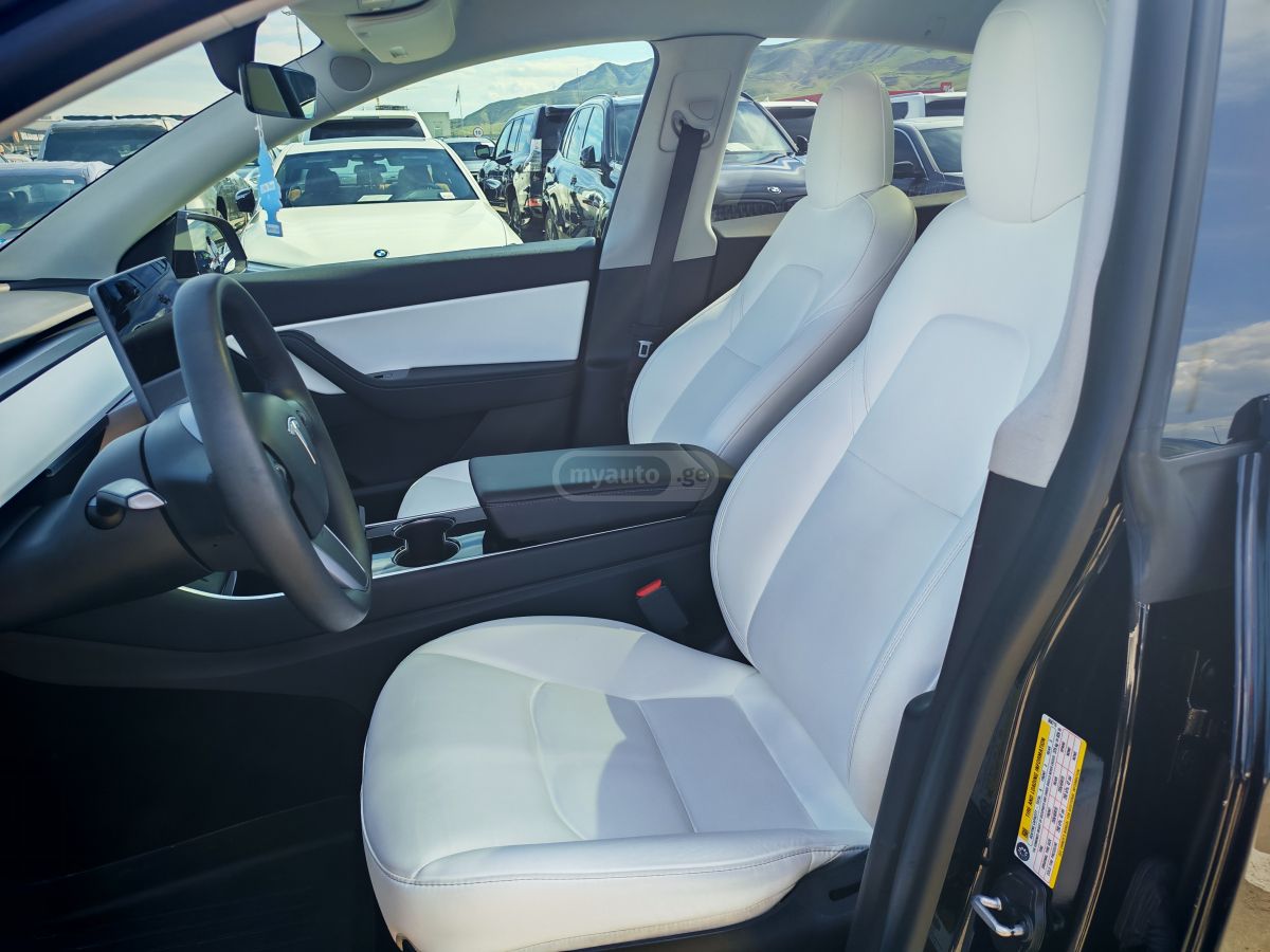 Tesla Model Y - фото 9