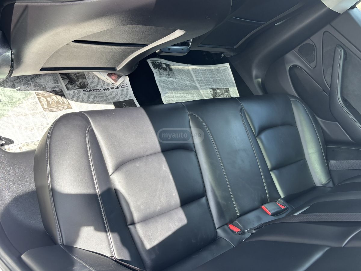 Tesla Model 3 - фото 7