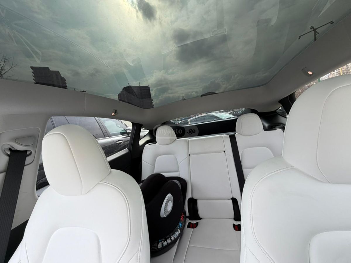 Tesla Model Y - фото 11