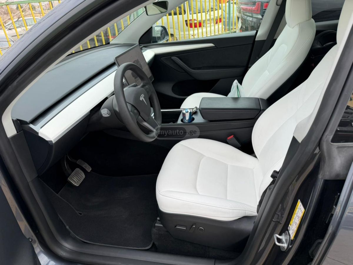 Tesla Model Y - фото 6