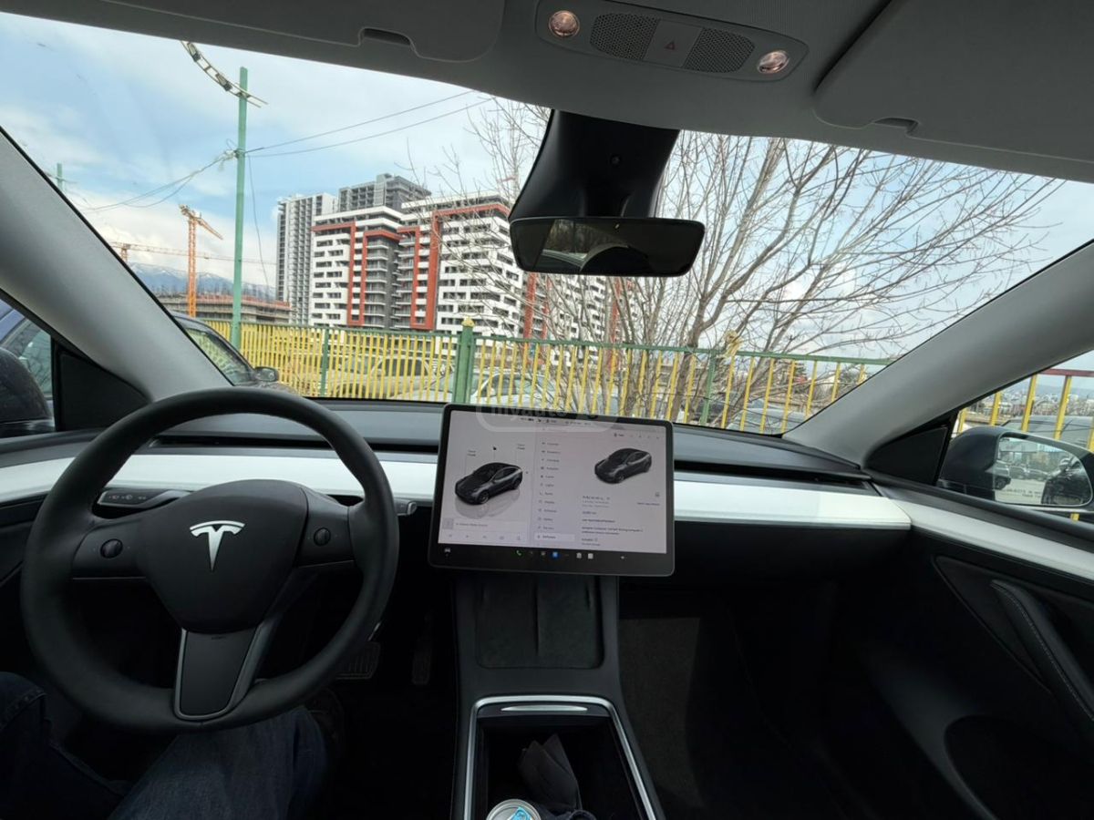 Tesla Model Y - фото 9