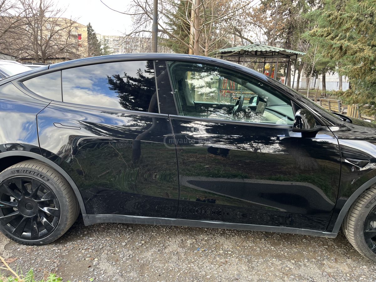 Tesla Model Y - фото 12