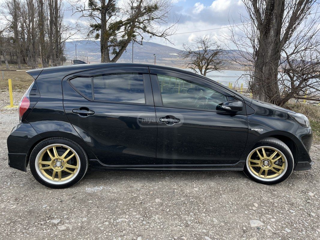 Toyota Aqua - фото 1