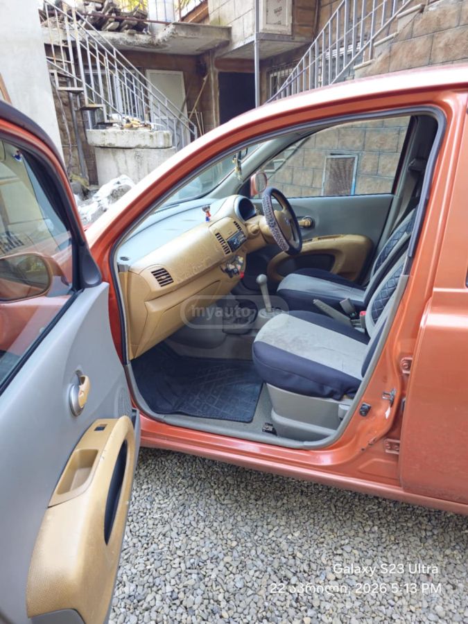 Nissan March - фото 6