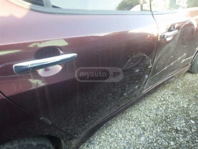 Nissan SL PLUS 4dr Hatchback Automati — миниатюра 7