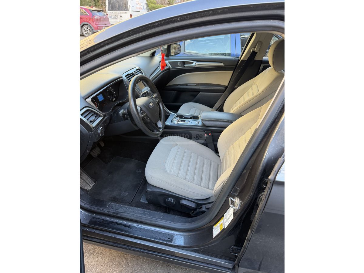 Ford Fusion - фото 11