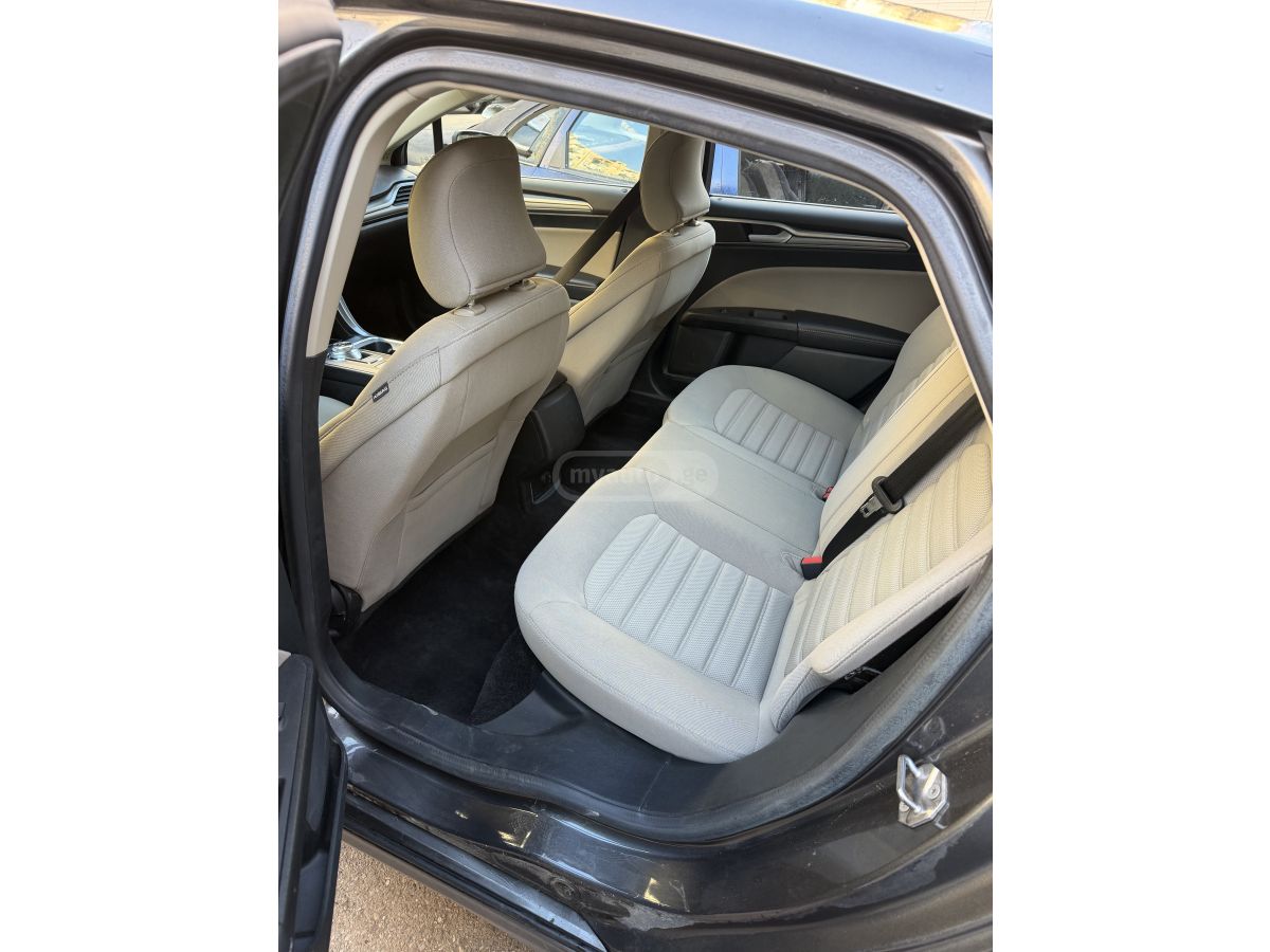 Ford Fusion - фото 12