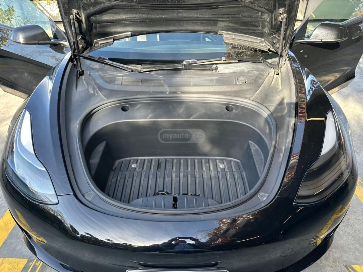 Tesla Model 3 - фото 10