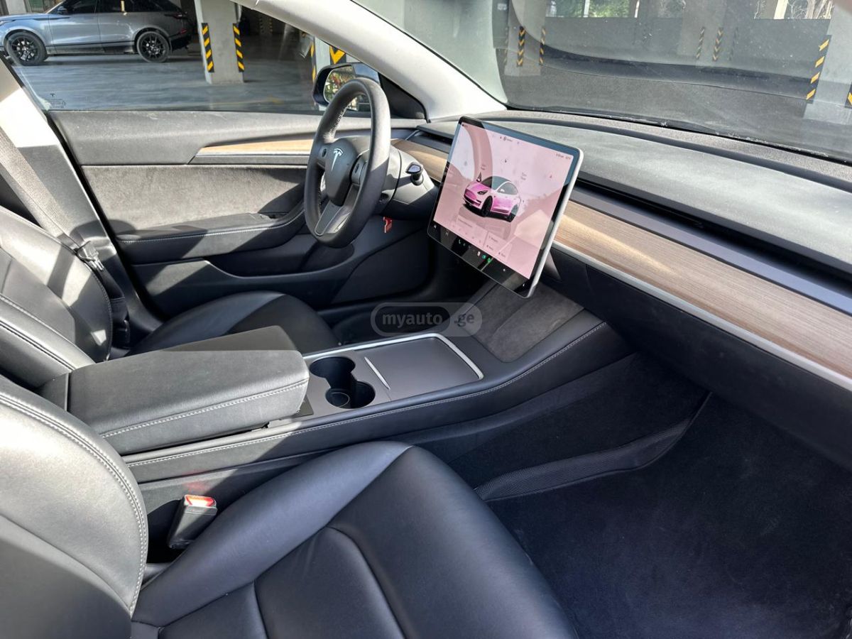 Tesla Model 3 - фото 11