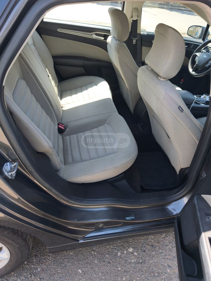 Ford Fusion - фото 9