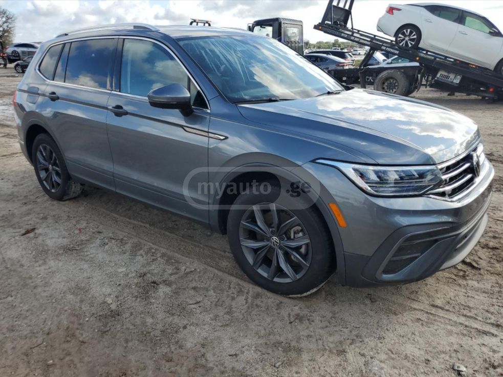 Volkswagen Tiguan - фото 1
