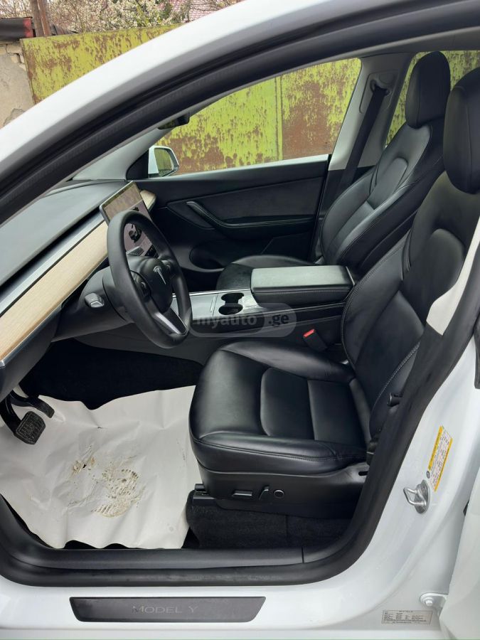Tesla Model Y - фото 10