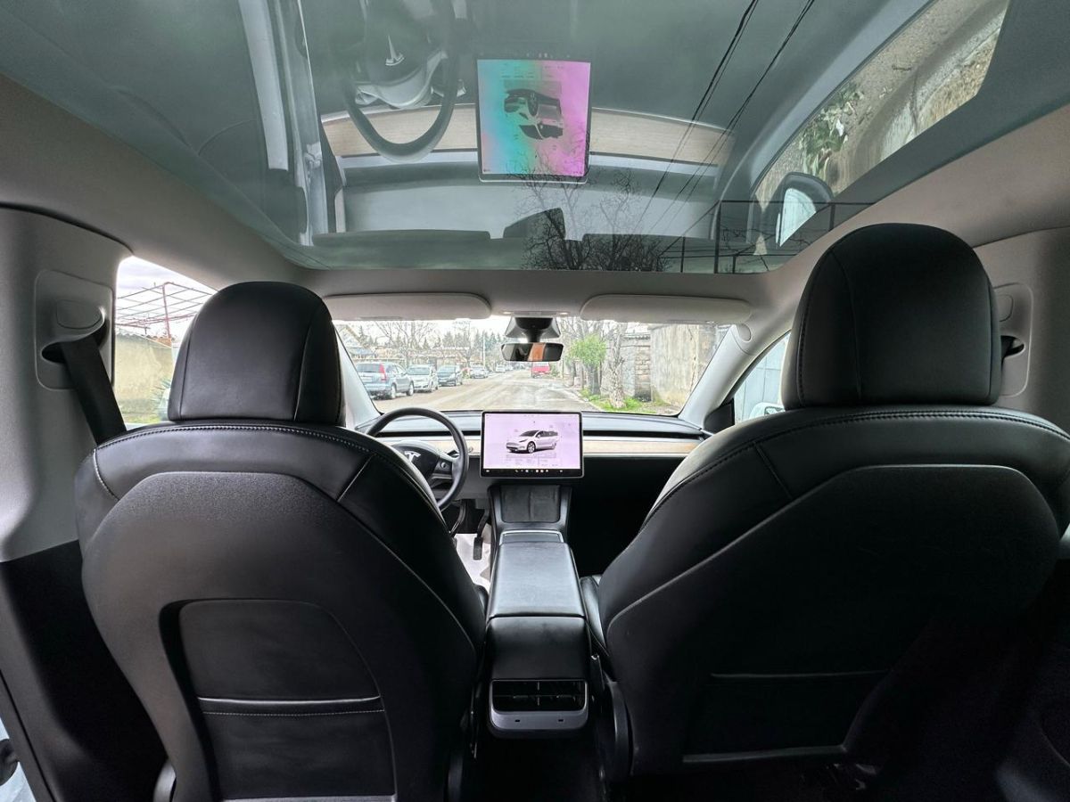 Tesla Model Y - фото 11