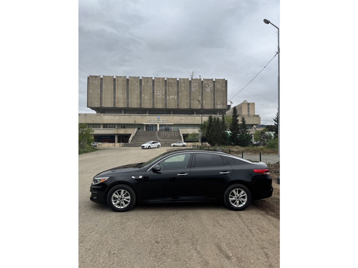 Kia Optima - фото 5