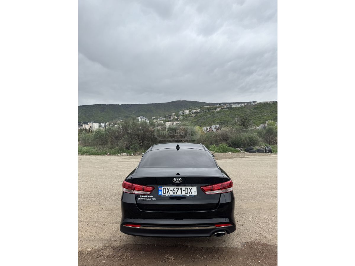 Kia Optima - фото 6