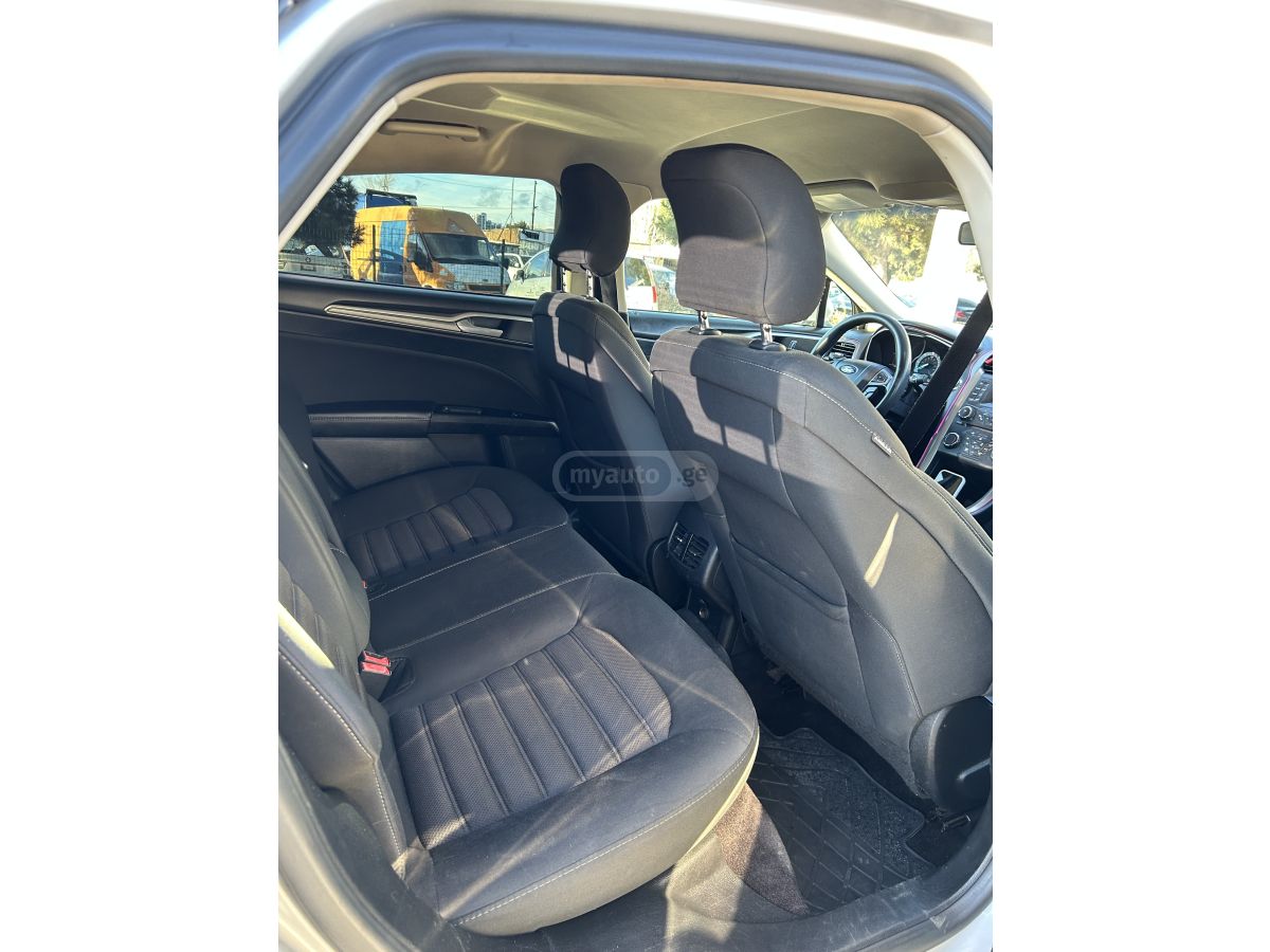 Ford Fusion - фото 10