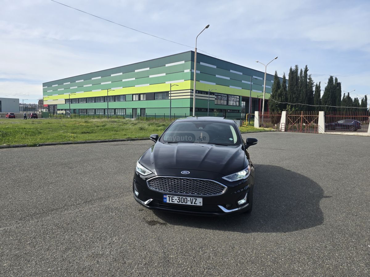 Ford Fusion - фото 12