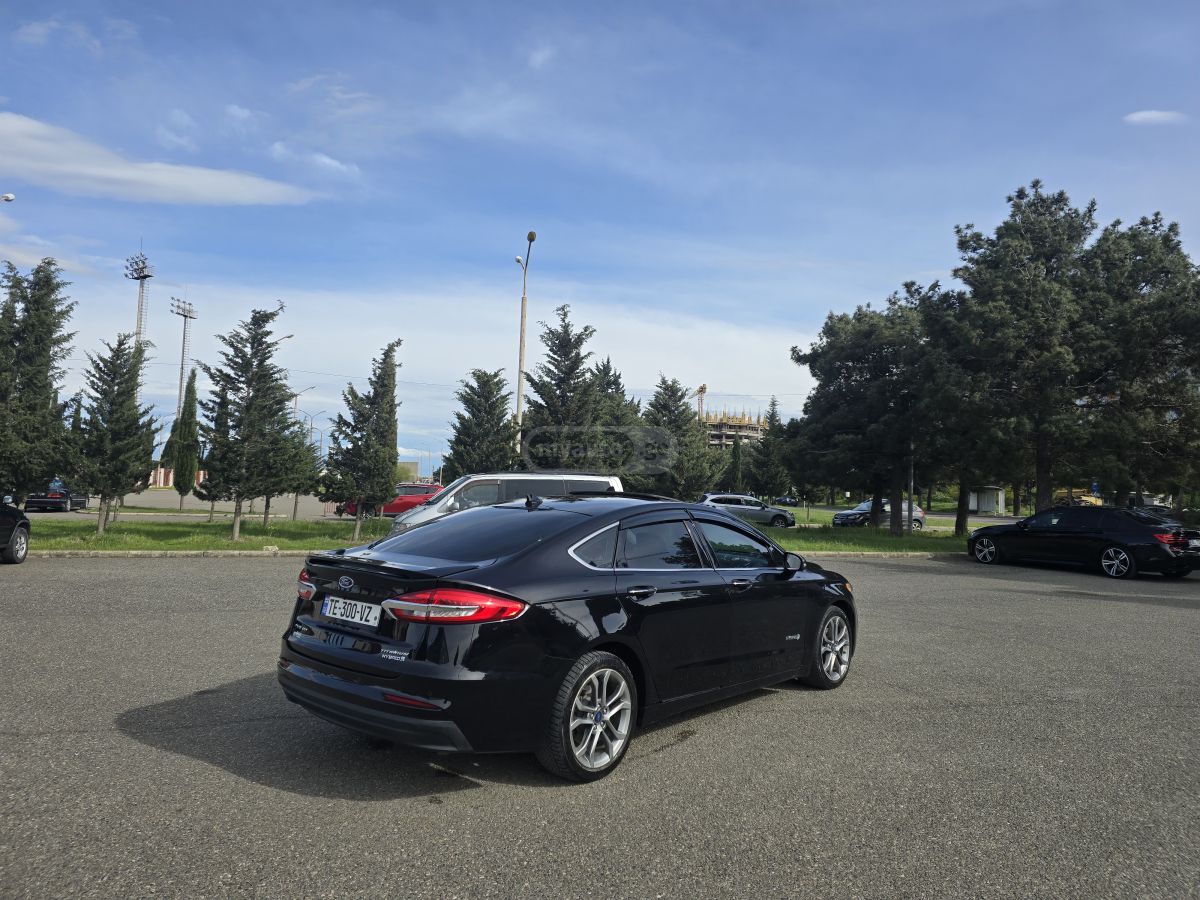 Ford Fusion - фото 13