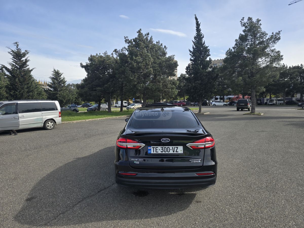 Ford Fusion - фото 4