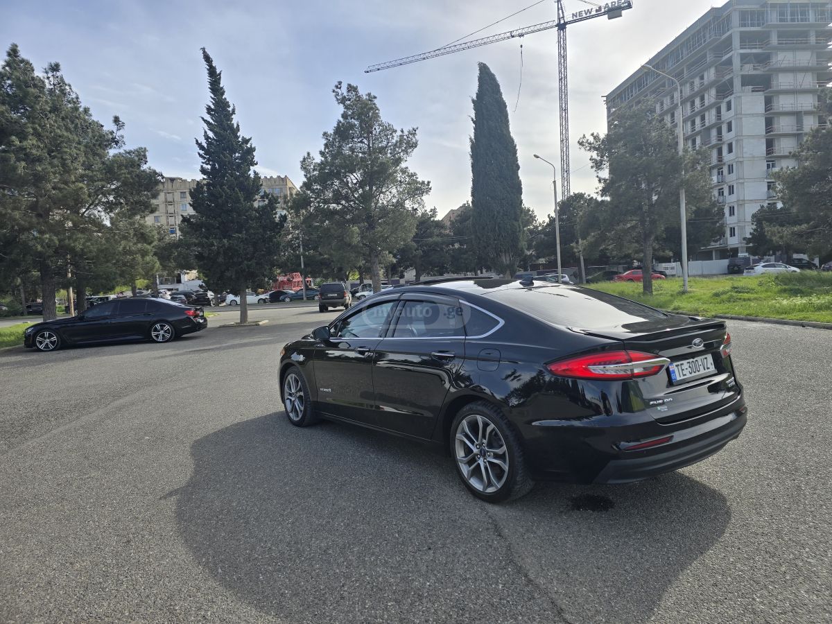 Ford Fusion - фото 6