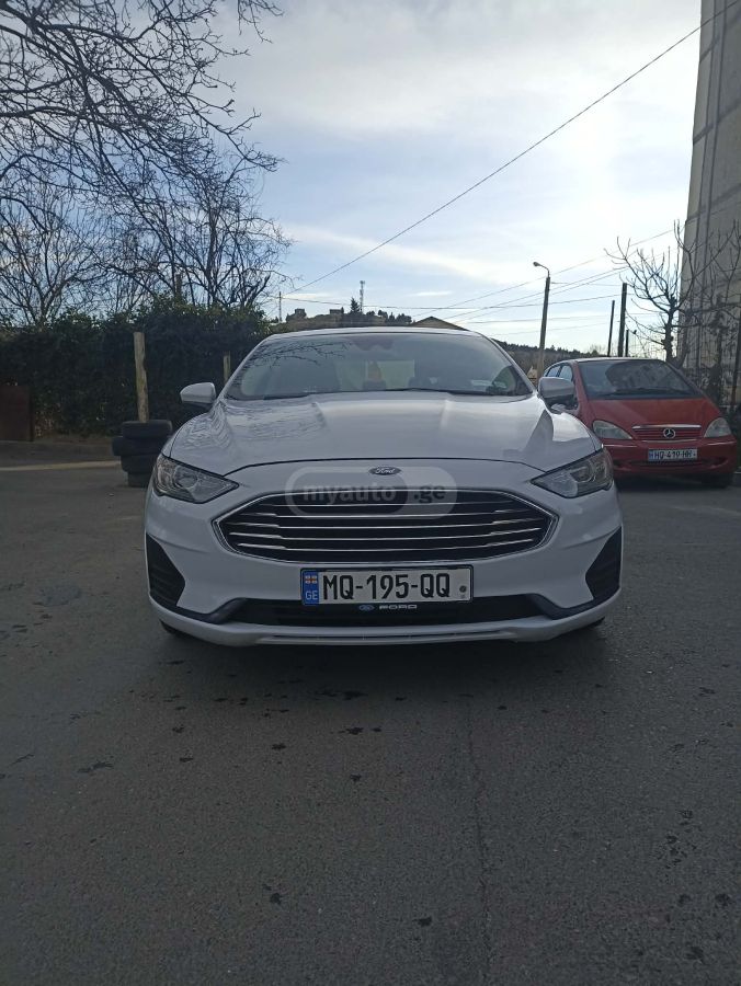 Ford Fusion - фото 7