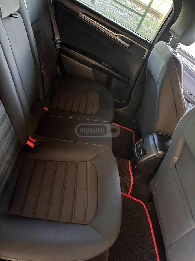 Ford Fusion - фото 13