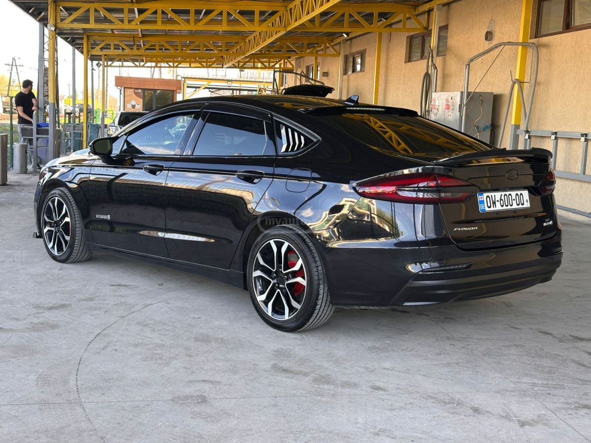 Ford Fusion - фото 6