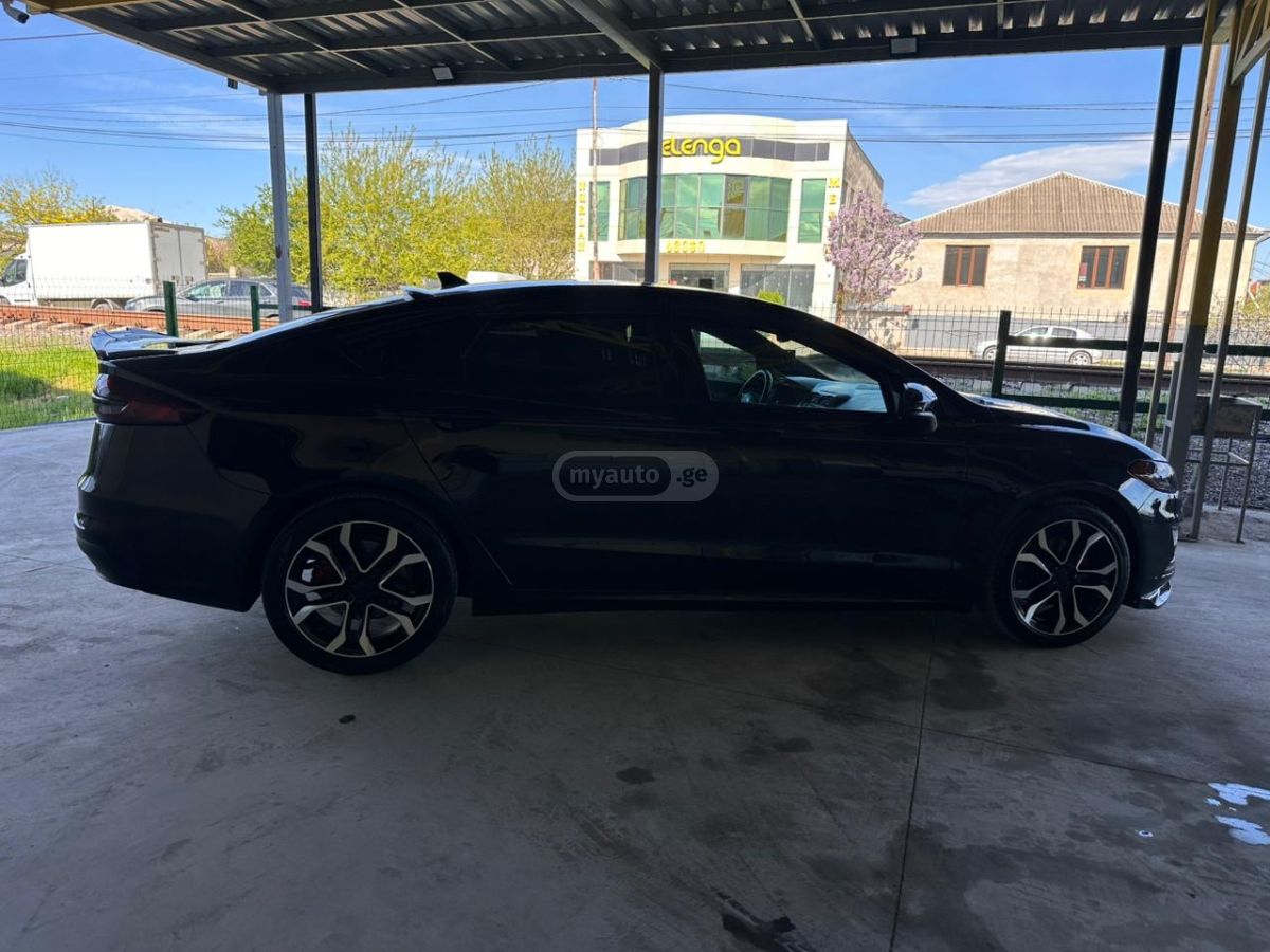 Ford Fusion - фото 7