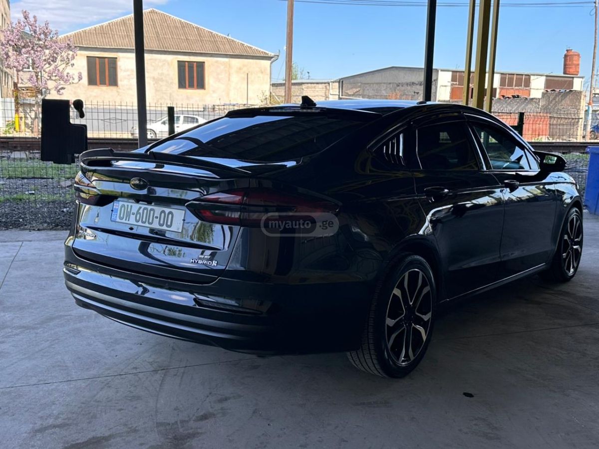 Ford Fusion - фото 8