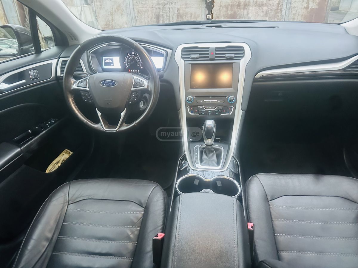 Ford Fusion - фото 6