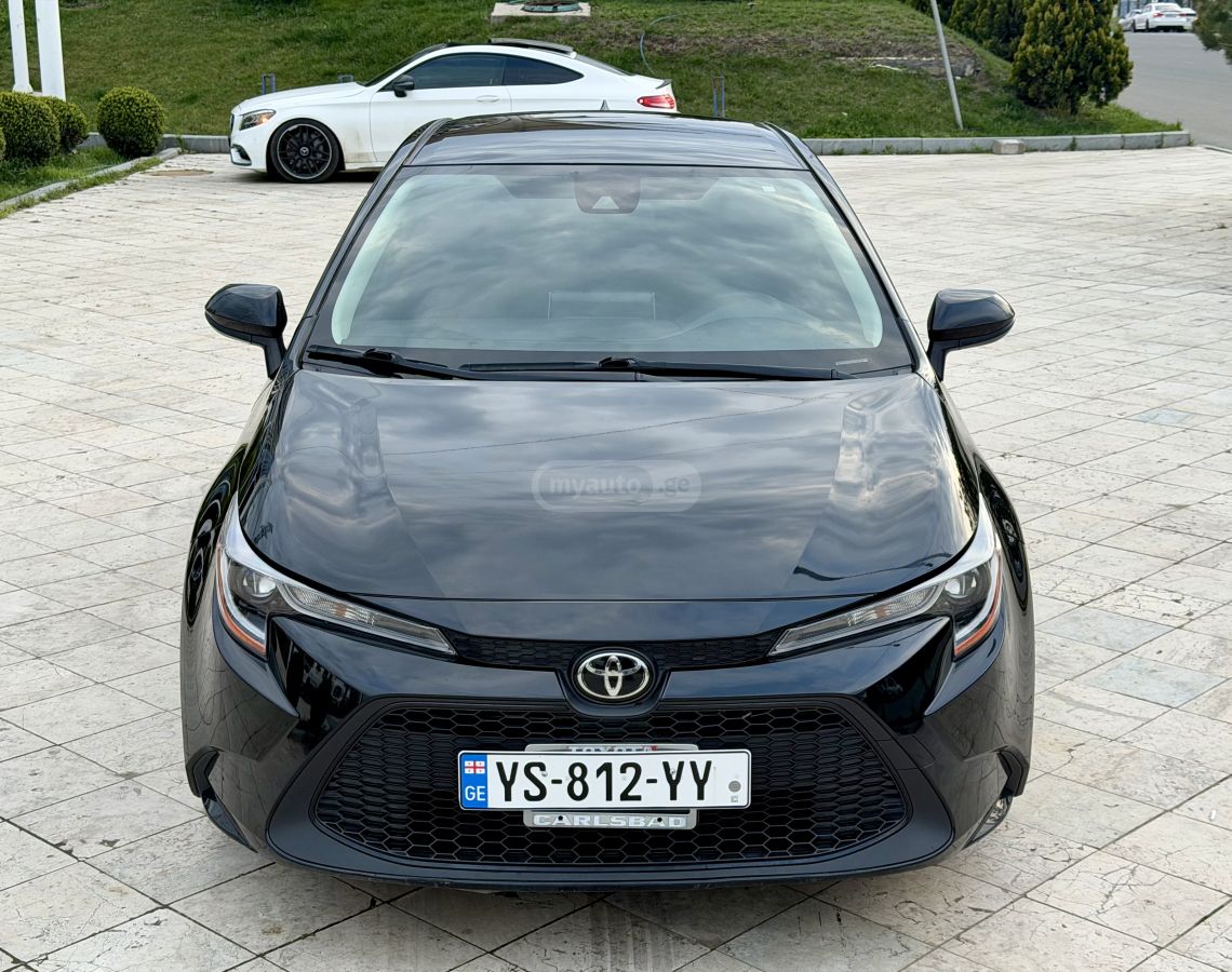 Toyota Corolla - фото 1