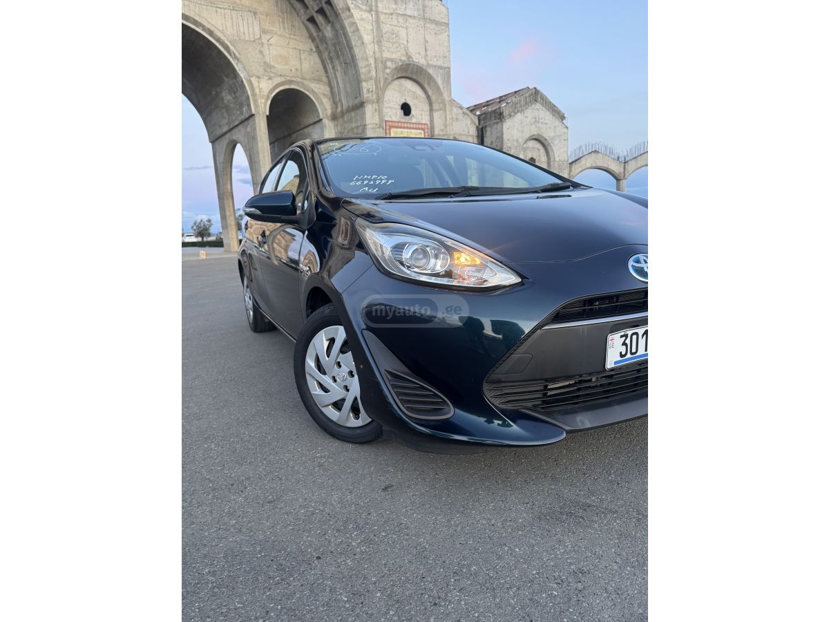 Toyota Aqua - фото 14