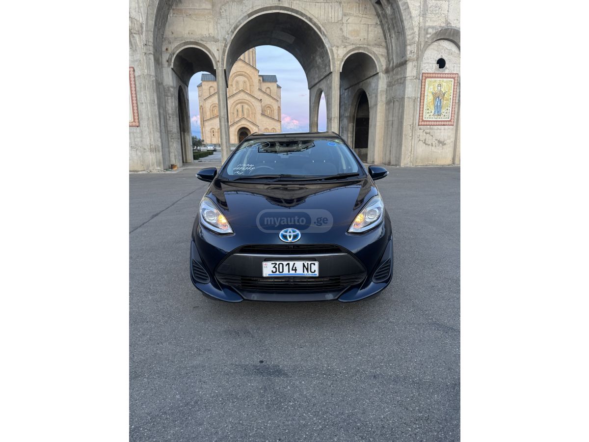Toyota Aqua - фото 8