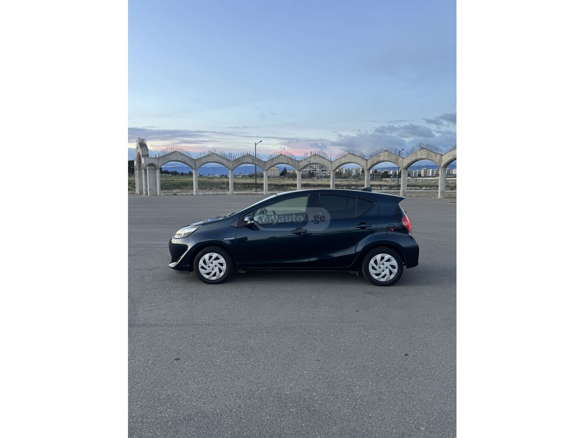 Toyota Aqua - фото 9