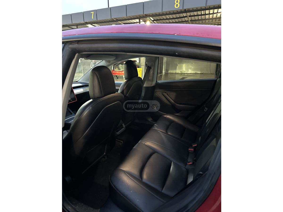 Tesla Model 3 - фото 7