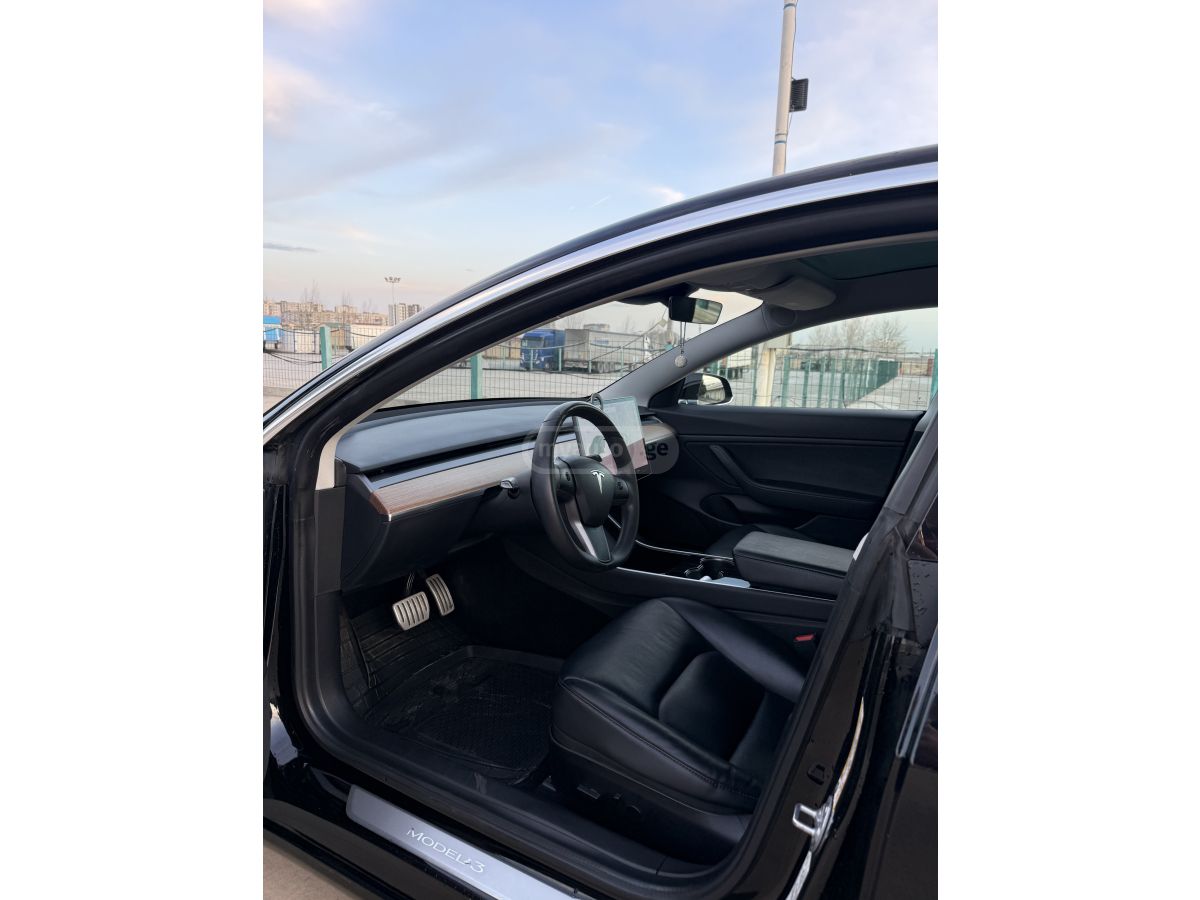 Tesla Model 3 - фото 10
