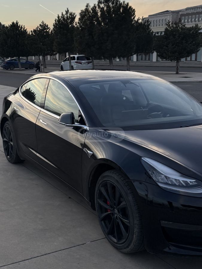 Tesla Model 3 - фото 2