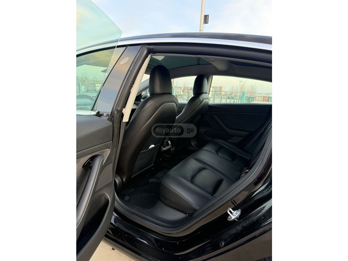 Tesla Model 3 - фото 9