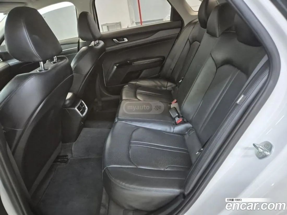 Kia Optima - фото 10