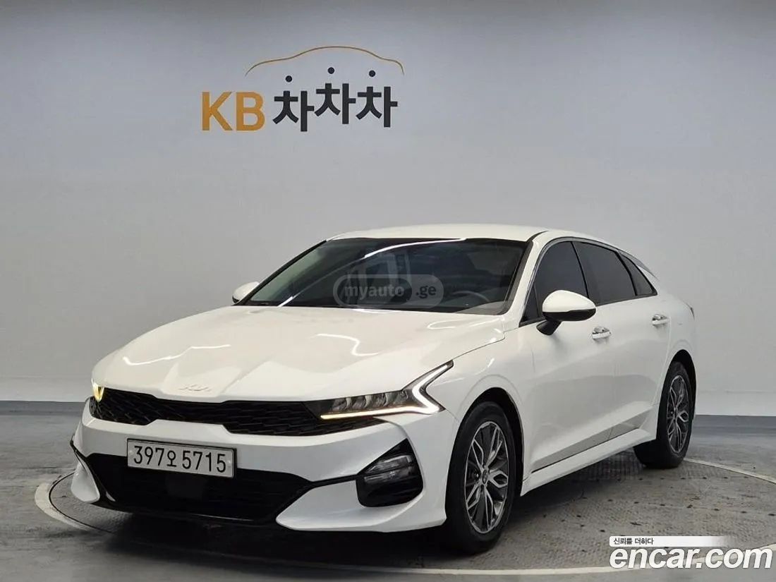 Kia Optima - фото 12